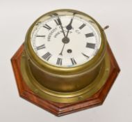 AN EARLY TWENTIETH CENTURY SHIP'S BELL STRIKING BULKHEAD CLOCK inscribed Prescott Clock Co to the