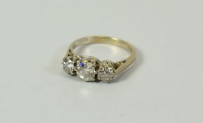 AN 18CT WHITE GOLD THREE STONE DIAMOND RING, the centre stone being the largest at approx 0.6ct, 3.