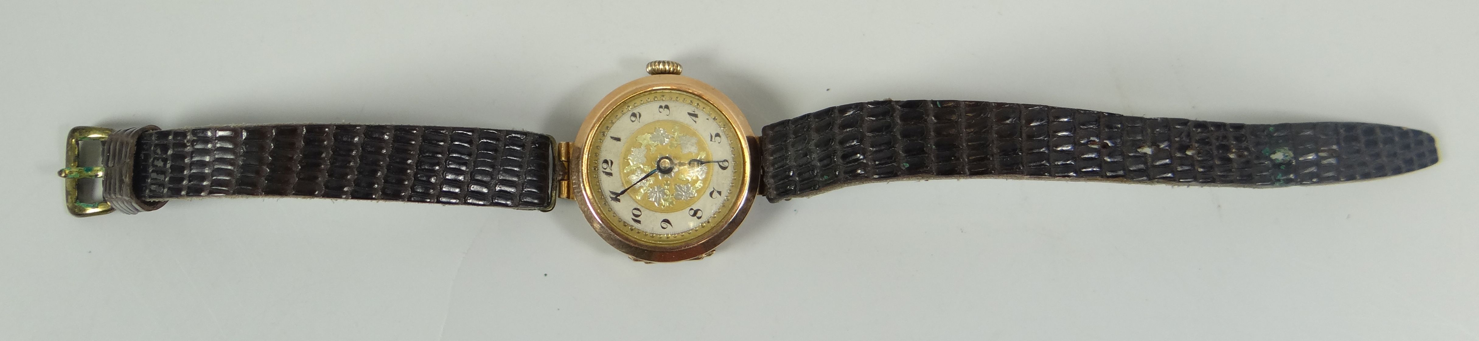 A 9CT YELLOW GOLD VINTAGE WRISTWATCH with later strap