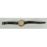 A 9CT YELLOW GOLD VINTAGE WRISTWATCH with later strap