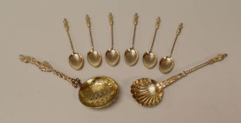 TWO SILVER APOSTLE SIFTER SPOONS with decorative stems; together with a set of six silver twist-stem
