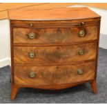 A GOOD TURN OF THE CENTURY BOW FRONT MAHOGANY CHEST OF DRAWERS of three graduated drawers and pull