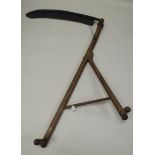 A NINETEENTH CENTURY ENGLISH SCYTHE with forked wooden handles, stretcher and twin grips (repair