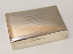 A SUBSTANTIAL SILVER CIGARETTE BOX machine turned all round and inscribed to the lid 'Tommy