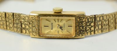 A 9CT YELLOW GOLD LADIES BRACELET WATCH BY ACCURIST '17 JEWELS' with winding mechanism and having