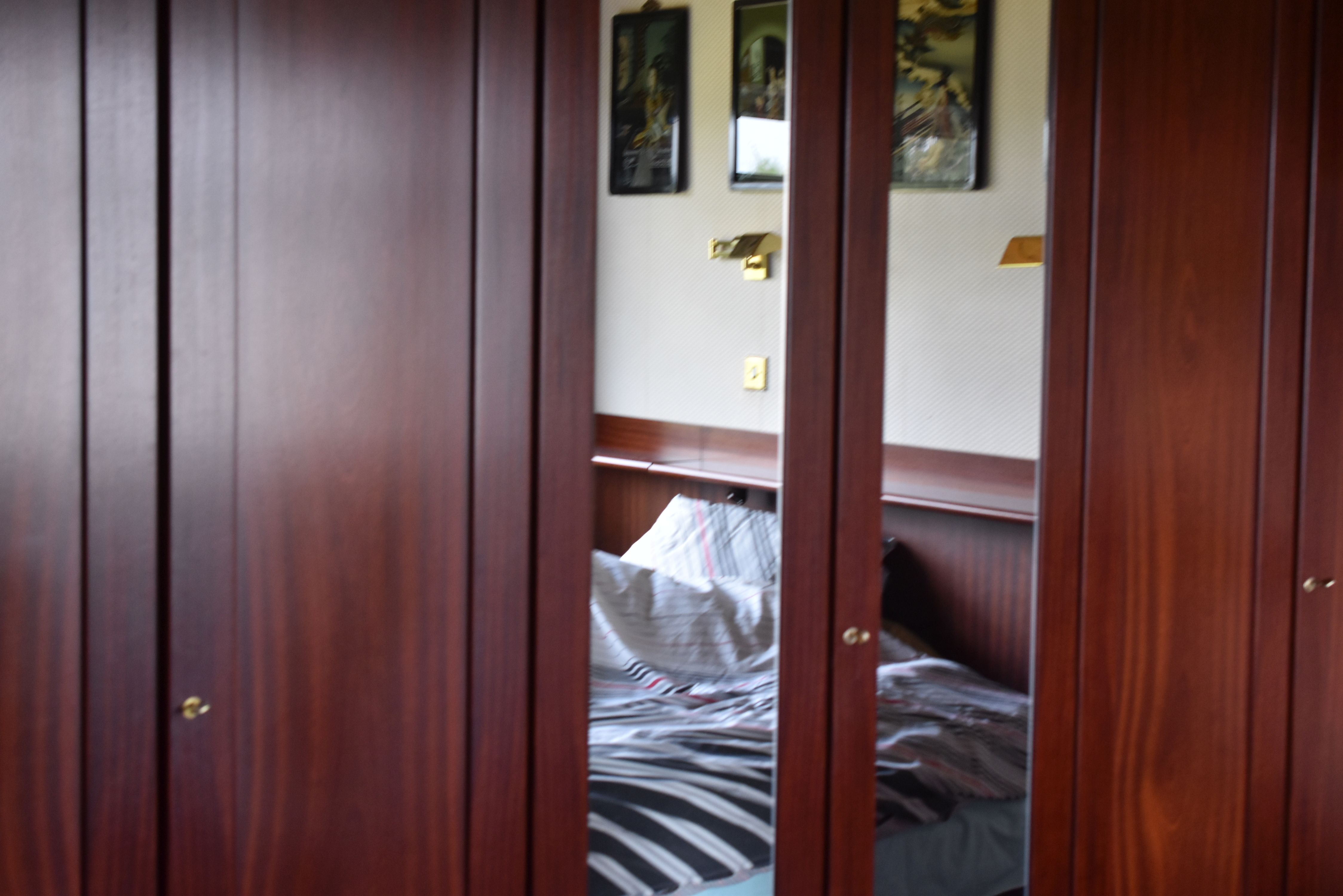 A HULSTA FURNITURE SUITE OF THREE TALL WARDROBES (value dependant on dismantling and assembling)