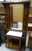 A GOOD REPRODUCTION MIRROR BACK HALL STAND with marble base and single drawer, 105cms wide x