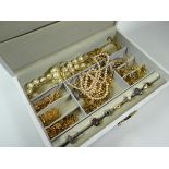 A MODERN JEWELLERY BOX & CONTENTS including yellow metal necklaces etc