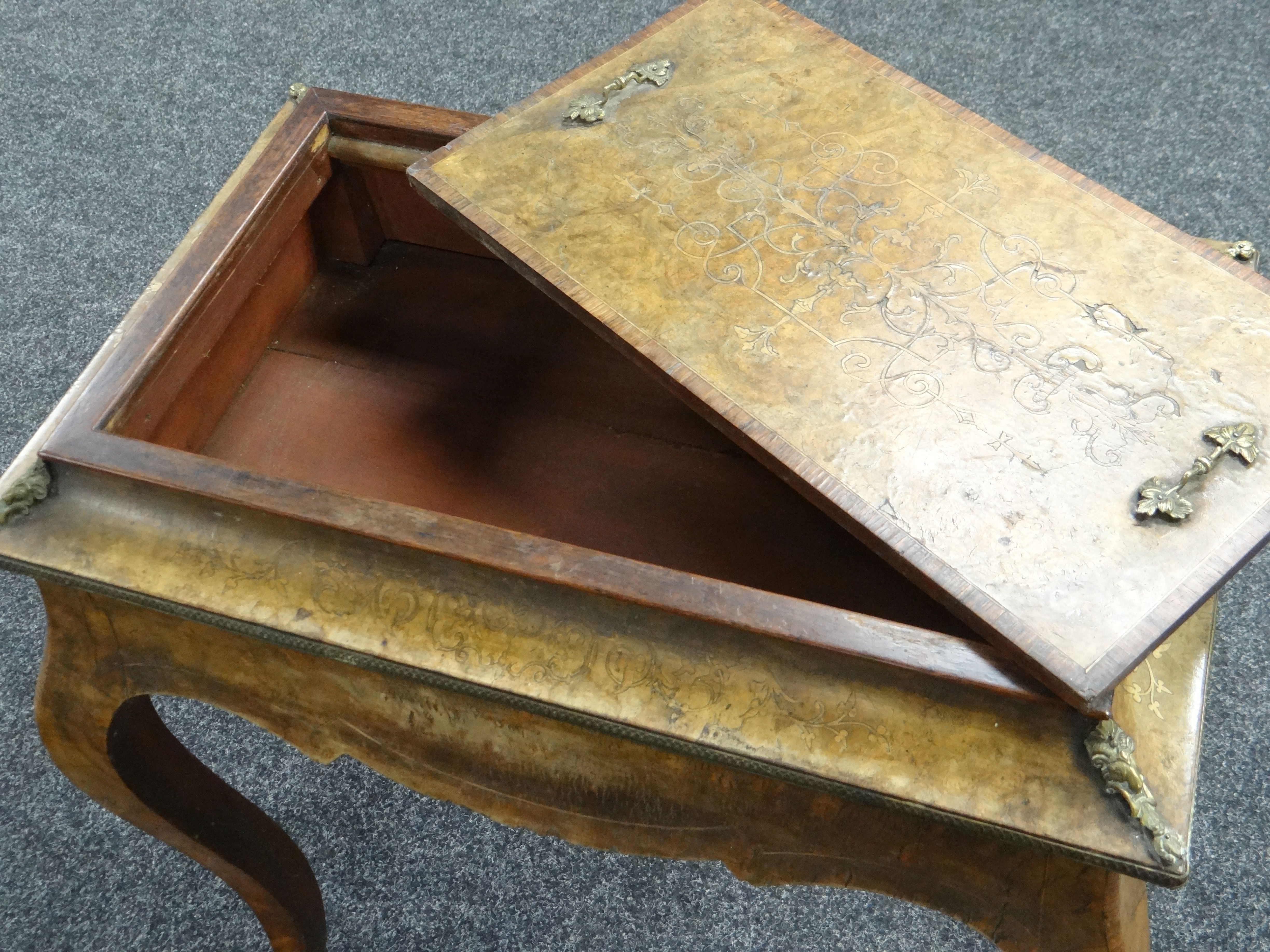 A NINETEENTH CENTURY MARQUETRY WALNUT SEWING TABLE with ormolu fittings and on shaped legs ( - Image 3 of 3
