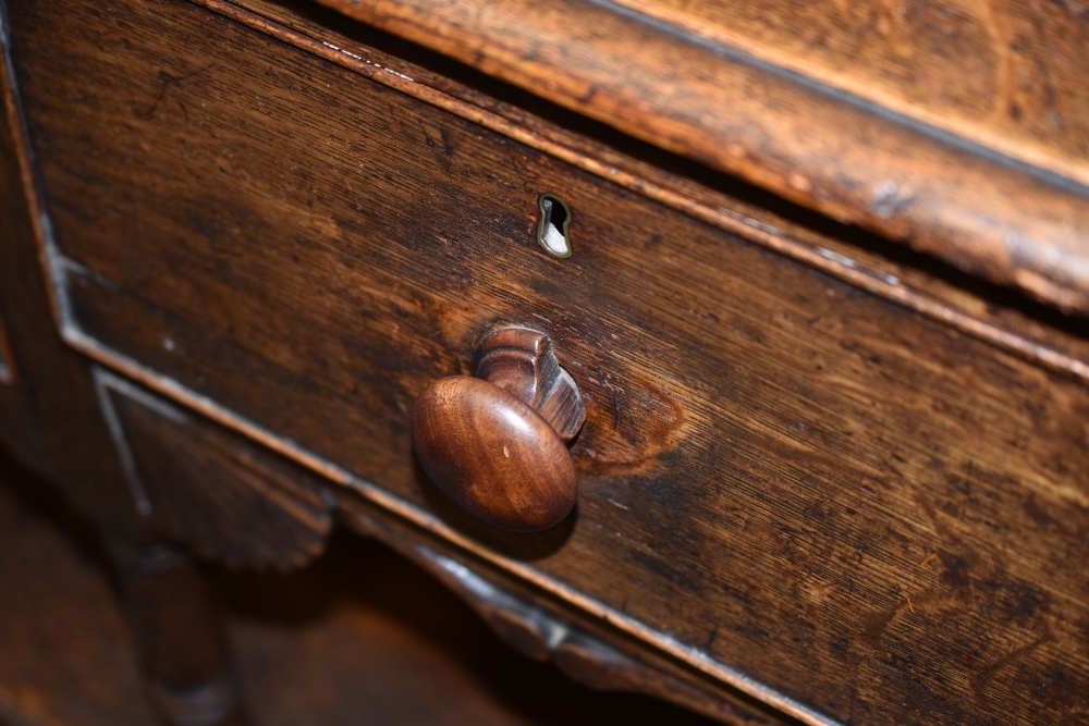 AN OAK WELSH DRESSER BASE with a good borded rack with two shelves, shaped sides and with old hooks, - Image 6 of 6