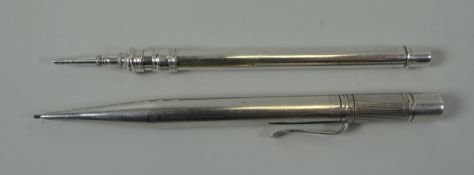 A HALLMARKED SILVER BARRELLED RETRACTABLE PENCIL and another unmarked