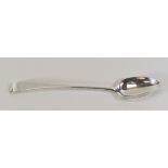 A LONG HANDLED GEORGE III SILVER SERVING SPOON, of plain form with monogrammed terminal, London