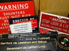 A PARCEL OF RAILWAY SIGNAGE including wooden destination platform signs, metal safety warnings etc