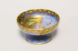 A CARLTONWARE 'PARADISE BIRD' RAISED DISH in mottled powder blue reserve with gold and brightly