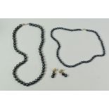 TWO NECKLACES OF BLACK PEARLS & SIMILAR EARRINGS both necklaces with clasps marked 925, 42 & 48cms