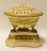 A ROYAL CHINA WORKS GRAINGER WORCESTER POT-POURRI & COVER raised on three claw feet over a shaped