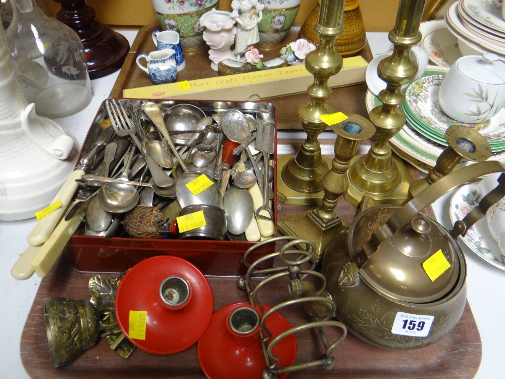 A quantity of metalware including large quantity of loose cutlery, brass candlesticks etc