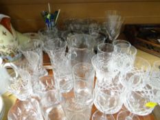 Two trays of various drinking glasses, jugs etc