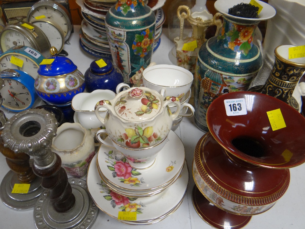 A quantity of mixed pottery and china including tea ware and a pair of barley-twist candlestick