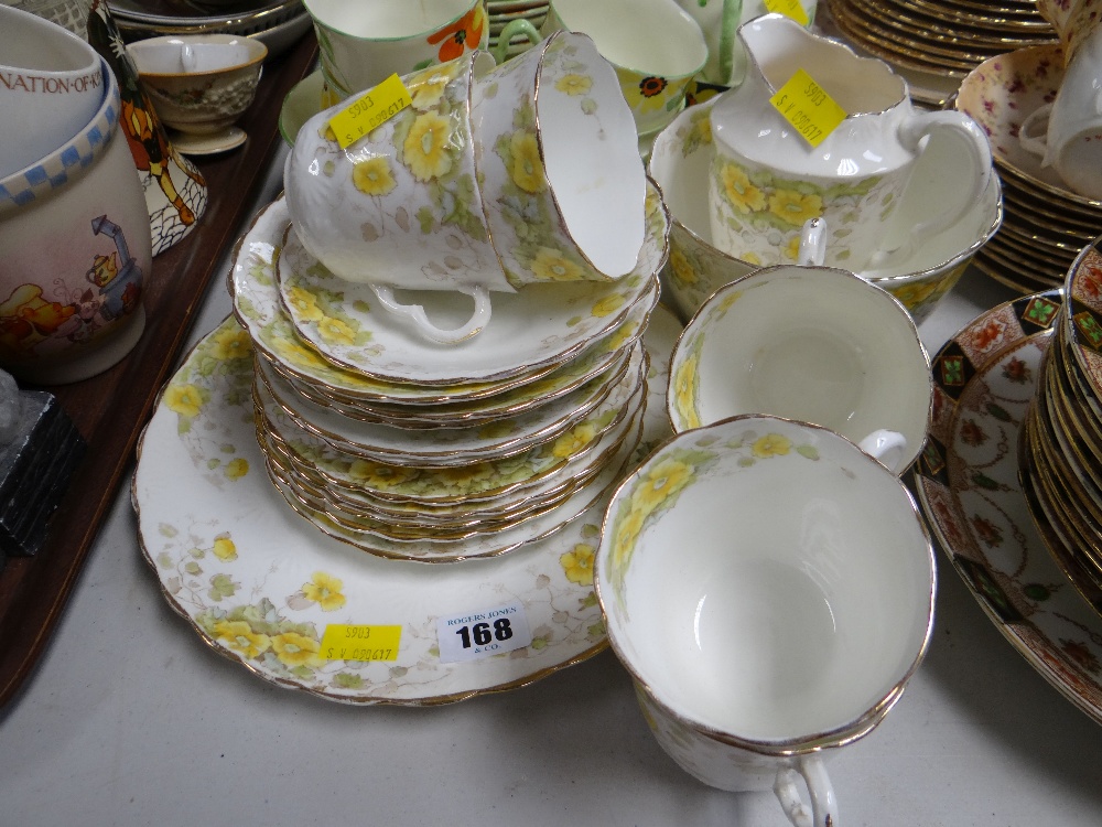 A quantity of Staffordshire yellow floral tea ware