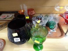 A quantity of mixed glassware including coloured and Carnival, decanters etc