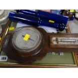 A wood and framed barometer, galleried EPNS tray, pseudo Bristol blue glass pepperettes etc