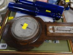 A wood and framed barometer, galleried EPNS tray, pseudo Bristol blue glass pepperettes etc