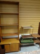 A parcel of furniture including tea trolley, telephone table, bookcase and sliding door teak