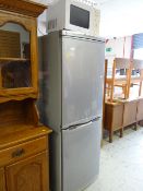 An LG Express Cool upright fridge freezer in grey together with a Matsui microwave oven