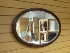 A vintage oval mirror