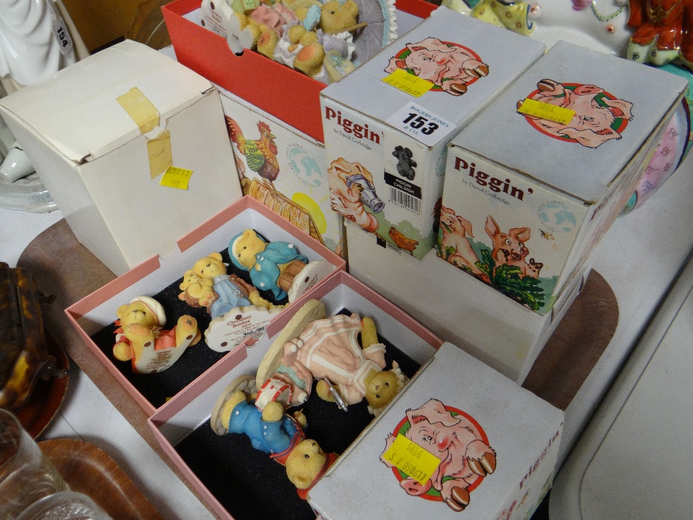 A quantity of Piggin' boxed figurines etc