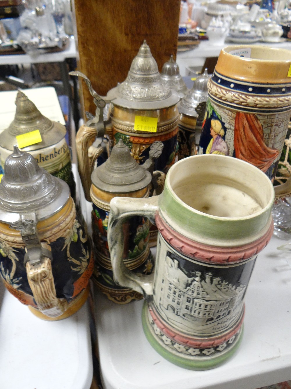 A collection of German pottery stein