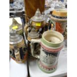 A collection of German pottery stein