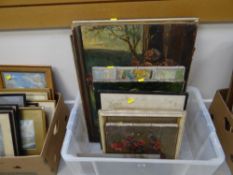 A box of framed pictures