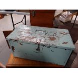 A painted metal toolbox and contents