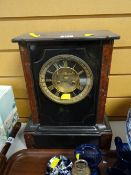 A good slate & marble French mantel clock with circular dial & Roman numerals