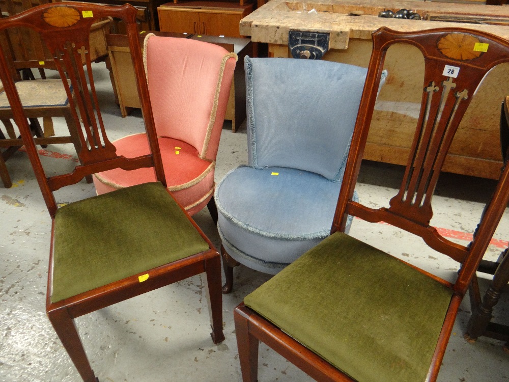 A pair of hall chairs with marquetry and comb backs and drop in seats together with a pair of tub