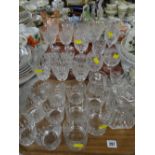 A quantity of drinking glasses