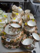 A quantity of mixed tea ware in two patterns