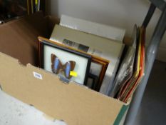 A box of framed prints etc