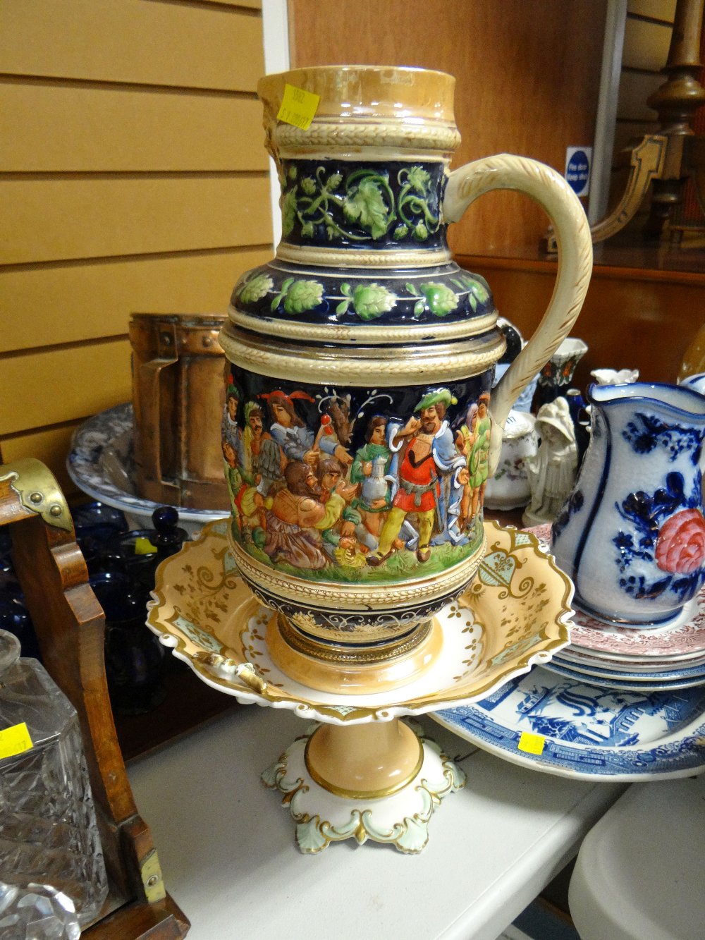 A tall German beer jug and a Staffordshire tazza