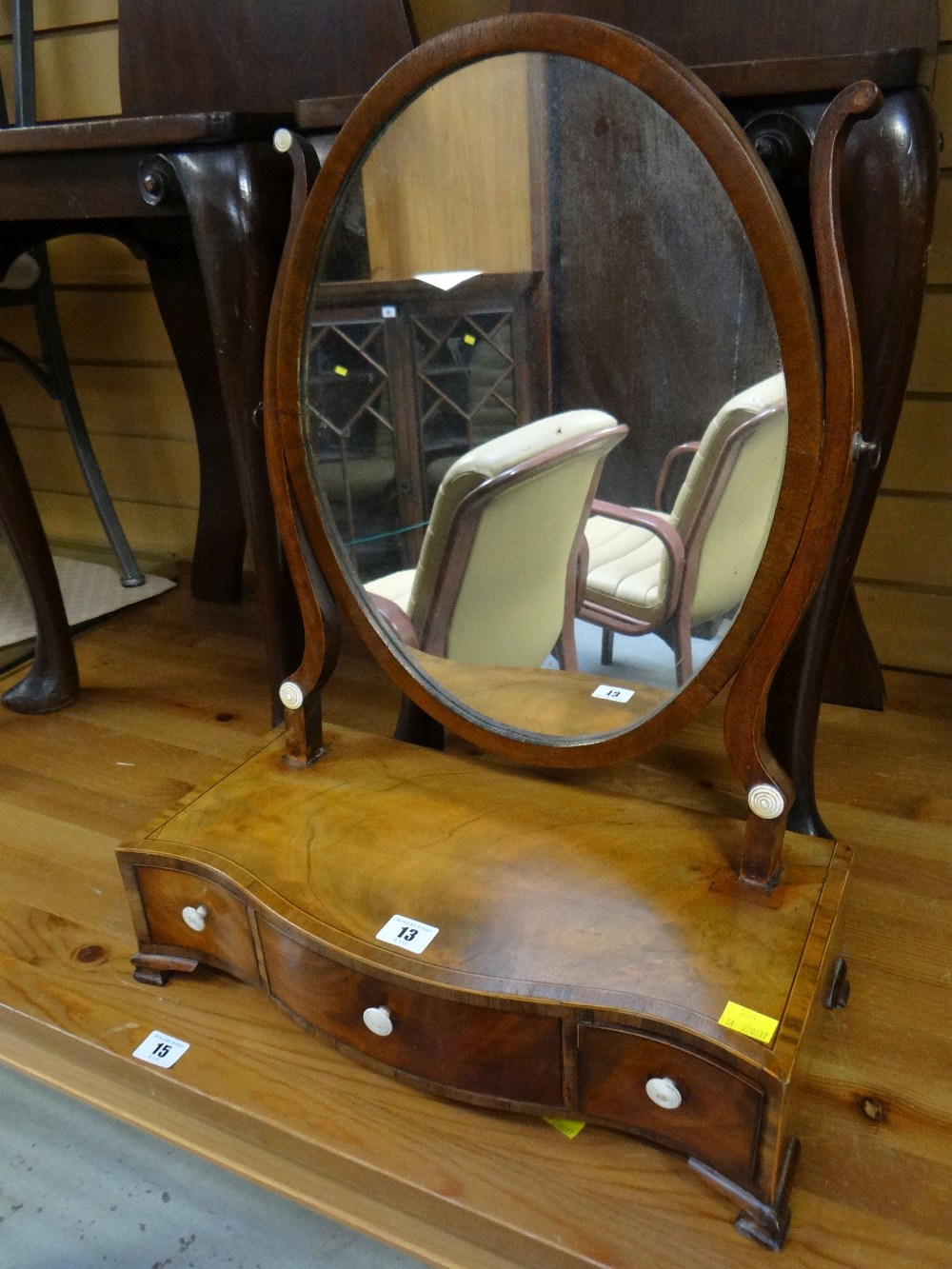 A good antique toilet mirror with serpentine front and drawers