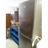 An upright Siemens fridge freezer