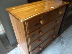 A pine chest of three long and two short drawers