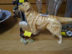A Beswick pottery model of a labrador and another of a wren