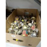 A box of brass bells etc