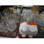 A large quantity of everyday drinking glasses