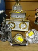 An Acctim reproduction carriage clock, a Swiza table barometer and clock, a glass clock and