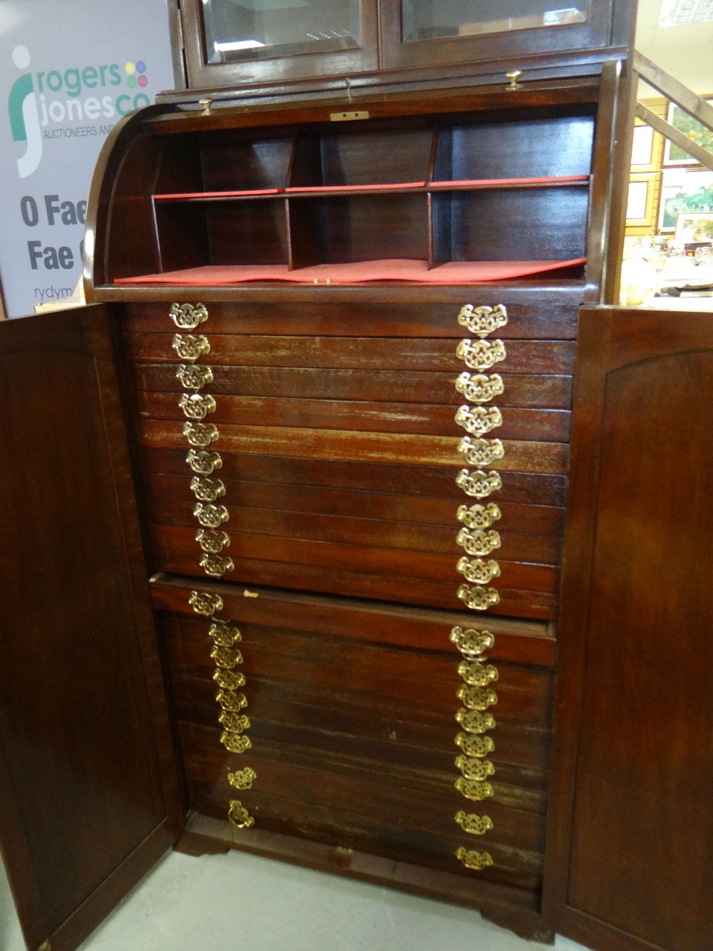 An unusual mahogany specimen cabinet with a tall two-door base revealing twenty long shallow drawers - Image 2 of 2