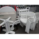 A suite of UPVC garden furniture including lounger, tea trolley, table and chairs